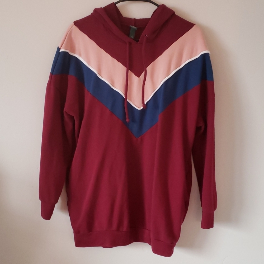 Maroon hoodie with navy, white,  and blush detail.